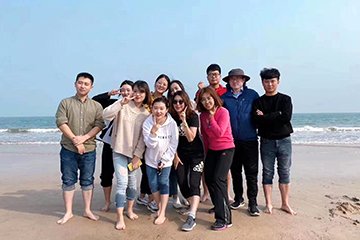 Group play by the sea