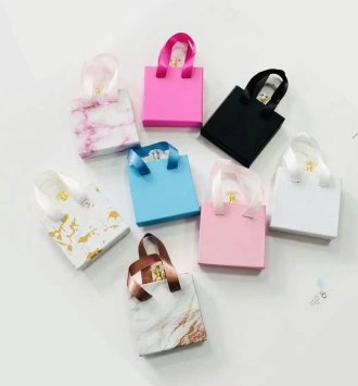 Paper box with ribbion handle