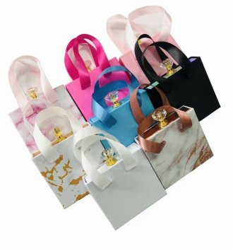 Paper box with ribbion handle